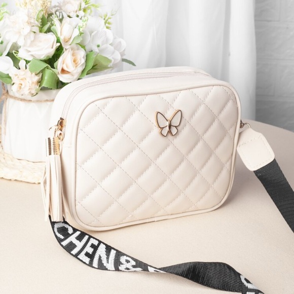 No brand Handbags - Chic Cream Quilted Crossbody Bag with Butterfly Accent
